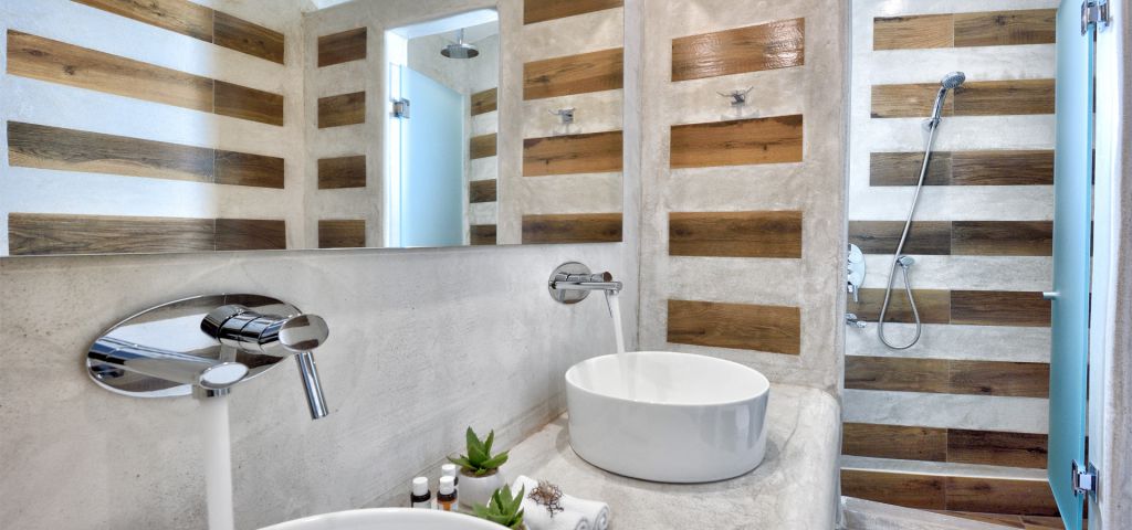 The modern bathroom at the Triple Room of Jenny`s Summer Houses in Mykonos.